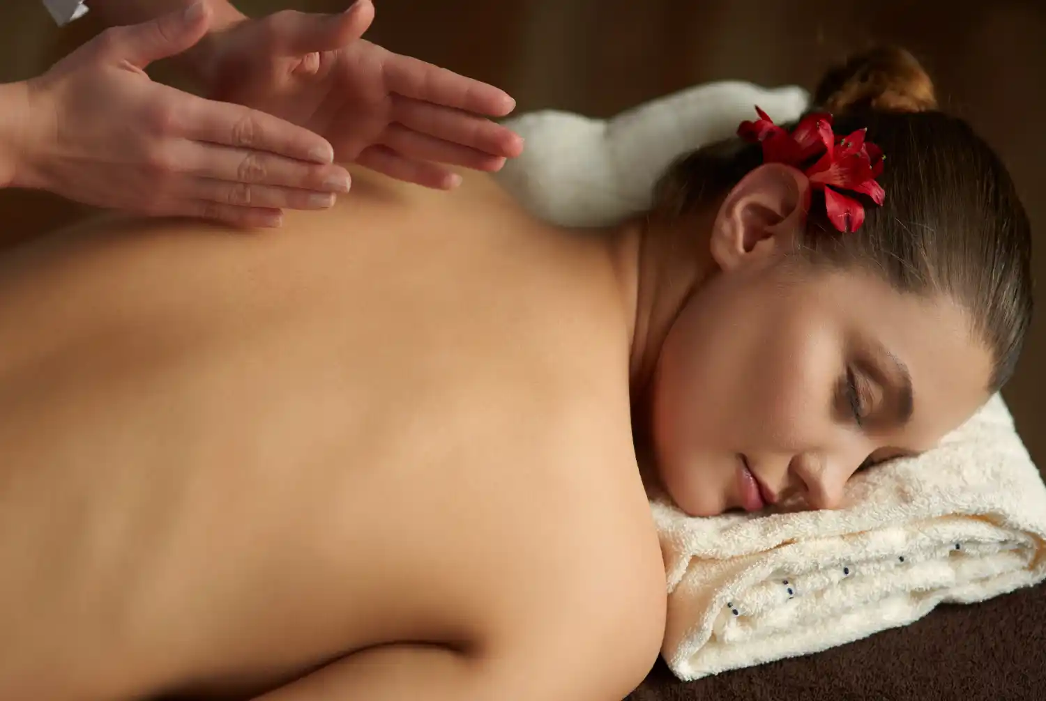 Thai massage therapist providing a relaxing treatment